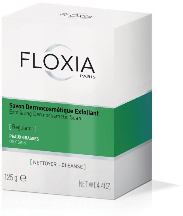 Emballage du Savon Dermocosmétique Exfoliant FLOXIA Paris pour peaux grasses. La boîte est majoritairement blanche avec une section verte et grise. Le texte comprend les détails du produit, son poids (125 g / 4,4 oz) et la phrase « Nettoyer - Cleanse » en bas.