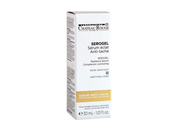 Un coffret blanc de Sérum Éclat Sérogel Château Rouge Paris. La face avant affiche en français les informations produit mettant en avant ses propriétés de soin correcteurs et unifiants. La boîte indique un volume de 30 ml (1,0 fl. oz.).