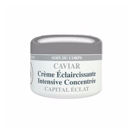 Gros plan d'un pot cylindrique blanc à couvercle gris contenant le « Soin du Corps Caviar Crème Éclaircissante Intensive Concentrée Capital Éclat ». Le texte est rédigé en français indiquant qu'il s'agit d'une crème corporelle concentrée et éclaircissante intensive.
