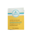 Une boîte jaune et blanche de savon au soufre Laino portant le logo de la marque en haut. Le texte comprend « 99 % d'ingrédients d'origine naturelle », « Savon au Soufre » et « Savon au Soufre ». La boîte contient 150 g (5,29 oz) de produit.
