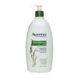 Un 20 fl. onces. flacon blanc de lotion hydratante quotidienne Aveeno Active Naturals avec un distributeur à pompe. L'étiquette comporte un texte vert et une image d'une plante d'avoine, indiquant que le produit est sans parfum et recommandé par les dermatologues pour les peaux sèches.