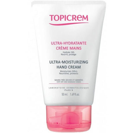 Un tube de crème pour les mains ultra-hydratante Topicrem est présenté. Le tube blanc comporte un texte rose et un capuchon rose. Le produit est conçu pour hydrater les mains pendant 24 heures et est disponible en format de 50 ml (1,69 fl oz).