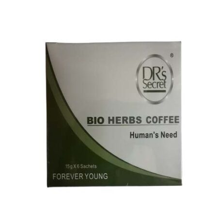L'image montre un emballage de produit intitulé « DR's Secret BIO HERBS COFFEE Human's Need ». L'emballage est principalement blanc avec des accents et du texte verts. Il indique qu'il contient 15 grammes x 6 sachets et porte la phrase "FOREVER YOUNG" en bas.