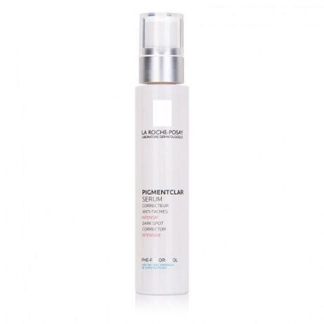 Un flacon blanc de Sérum Pigmentclar La Roche-Posay. Le flacon est cylindrique avec un distributeur à pompe et un bouchon argenté. Le texte sur le flacon indique « Pigmentclar Serum Correcteur Anti-Taches Intensive Dark Spot Corrector ». Le logo de la marque se trouve au-dessus du nom du produit.