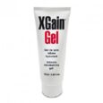 Un tube blanc étiqueté « XGain Gel » avec du texte en noir et rouge. Le tube le présente comme un gel hydratant intime, avec le texte français "Gel de soin intime hydratant" et le volume est de 75 ml ou 2,48 fl. onces.