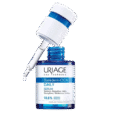 Image d'un flacon bleu de Sérum Quotidien Uriage Bariéderm-CICA avec étiquetage blanc et bleu. Le flacon est ouvert avec un applicateur compte-gouttes positionné au-dessus, affichant une goutte de sérum à l'embout. L'étiquette indique qu'il contient 10,5 % d'ingrédients actifs.