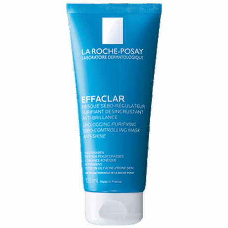 Un tube bleu de Masque Purifiant Débouchant Effaclar de La Roche-Posay. Le texte sur le tube est en français et en anglais, indiquant qu'il est destiné aux peaux grasses et à tendance acnéique, contrôle le sébum et réduit la brillance. Le tube contient 100 mL et est fabriqué en France.