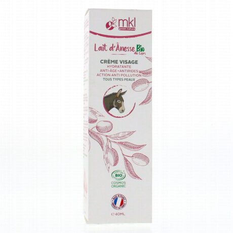 Grande boîte rectangulaire à fond blanc. Il comporte un logo rose et un texte indiquant « Lait d'Anesse Bio » et « Crème Visage », ainsi qu'un texte français supplémentaire détaillant les avantages du produit. Une image d'une tête d'âne est entourée d'illustrations botaniques.