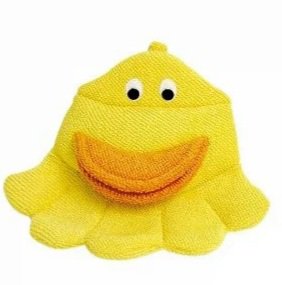 Une peluche jaune vif en forme de pieuvre avec un large sourire orange et de grands yeux blancs. Le jouet a plusieurs pattes saillantes et une apparence joyeuse semblable à celle d’un dessin animé.