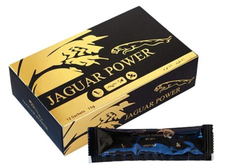 Une boîte dorée et noire labellisée « Jaguar Power » contient 12 sachets de 15g chacun. La boîte présente une silhouette de jaguar et une scène de jungle. Un seul sachet noir portant une marque similaire est affiché devant la boîte.