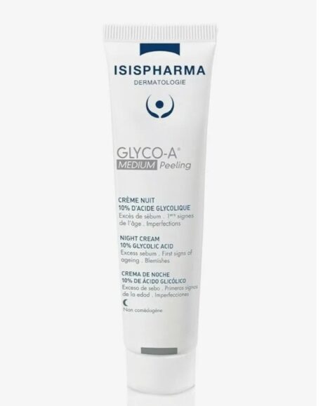 un tube blanc de crème de nuit isispharma glyco a medium peeling est présenté sur un fond blanc. la crème contient 10 % d'acide glycolique et est étiquetée pour réduire les premiers signes de vieillissement et les imperfections. le texte sur le tube est écrit en français, en anglais et en espagnol.