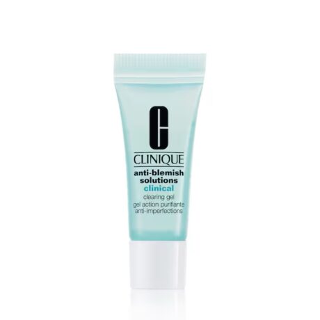 un petit tube de gel nettoyant clinique anti imperfections clinique, avec une étiquette bleu clair et un texte noir. le tube a un bouchon blanc et est conçu pour traiter les imperfections.