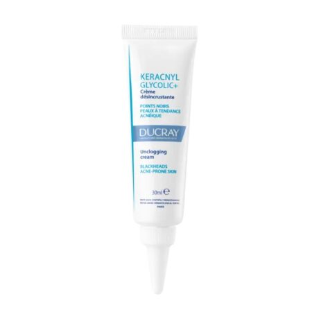 tube blanc de crème désincrustante ducray keracnyl glycolic+, conçu pour les points noirs et les peaux à tendance acnéique. le tube présente des touches de bleu et un texte détaillant son objectif et son utilisation. le volume est de 30 ml.