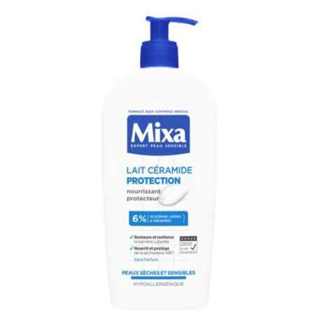 flacon blanc de mixa lait céramide protection avec pompe bleue. l'étiquette porte la mention « nourrissant protecteur », qui met en valeur 6 % de lipides d'avoine et de céramides pour les peaux sèches et sensibles. hypoallergénique et testé dermatologiquement.