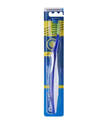 une brosse à dents à poils moyens avec un manche bleu et blanc, emballée dans un blister bleu et jaune. l'emballage porte la marque osta et mentionne des propriétés antibactériennes.
