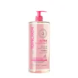 bouteille en plastique transparente avec pompe rose contenant le gel douche topicrem ultra hydratant. l'étiquette comporte la marque et les détails du produit. la bouteille mesure 1000 ml ou 33,8 fl. oz. et affiche un symbole de certification hypoallergénique.