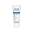 un tube de uriage bariéderm crème isolante réparatrice est présenté sur fond blanc. l'emballage comporte un texte bleu et blanc détaillant ses propriétés protectrices et réparatrices.