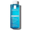flacon bleu de shampoing kerium doux extrême de la roche posay. l'étiquette le présente comme un shampoing gel apaisant et anti démangeaisons pour les cuirs chevelus sensibles et les cheveux normaux, améliorant la brillance et procurant une haute nutrition. la taille du flacon est de 400 ml.