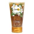 tube de gommage corporel au monoï de tahiti de lovea. l'emballage est marron avec un motif floral composé de fleurs blanches et de feuilles vertes. le texte indique qu'il s'agit d'un produit de 150 ml aux propriétés exfoliantes.