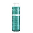 flacon cylindrique transparent de lotion purifiante hyseac d'uriage au liquide turquoise. l'étiquette détaille ses bienfaits pour resserrer les pores, affiner la texture et éliminer la brillance. le flacon contient 250 ml.