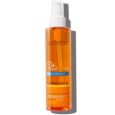 flacon orange de la roche posay anthelios xl huile nutritive confort spf 50+ avec vaporisateur, avec protection uva et uvb. l'étiquette porte les inscriptions « 50+ » et « 200 ml » en blanc sur fond transparent.