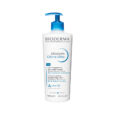 un flacon pompe blanc de 500 ml de bioderma atoderm crème ultra, une crème hydratante ultra nourrissante pour les peaux sensibles normales à sèches, avec des accents bleus et un texte français anglais sur l'étiquette.
