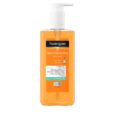 un flacon de nettoyant pour le visage neutrogena spot controlling avec un liquide orange, un distributeur à pompe blanc et une étiquette affichant des informations sur le produit en anglais et en arabe.