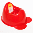 chaise pot en plastique rouge vif avec dossier, portant une étiquette jaune et orange indiquant "nuk learn to" et "lehrto...", conçue pour les tout petits, sur fond blanc.